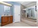 Bathroom featuring a tub, a neutral color scheme, and a wood vanity with sink at 1759 Nuremberg Boulevard, Punta Gorda, FL 33983