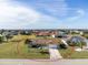 Single-Gathering home with driveway and landscaped yard at 1759 Nuremberg Boulevard, Punta Gorda, FL 33983