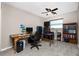 Home office with a desk and built-in bookshelves at 1759 Nuremberg Boulevard, Punta Gorda, FL 33983