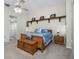 Spacious Primary bedroom with a large bed and built-in shelving at 1759 Nuremberg Boulevard, Punta Gorda, FL 33983