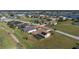 Aerial view of single-Gathering home with pool and landscaped yard at 1759 Nuremberg Boulevard, Punta Gorda, FL 33983