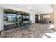 Covered patio with seating area and view of refreshing pool at 1759 Nuremberg Boulevard, Punta Gorda, FL 33983