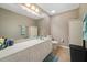Clean bathroom with vanity, toilet and mirror at 5127 Melbourne St # F-204, Port Charlotte, FL 33980