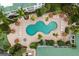 Aerial view of resort-style pool and spa at 5127 Melbourne St # F-204, Port Charlotte, FL 33980