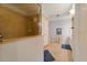 Bathroom with shower, double vanity, and tile floors at 5127 Melbourne St # F-204, Port Charlotte, FL 33980