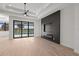 Open living space featuring a fireplace and sliding doors to the pool at 675 Monaco Dr, Punta Gorda, FL 33950