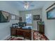 Bright office featuring wood desk, ceiling fan, and decor at 25601 Heritage Lake Blvd # 46, Punta Gorda, FL 33983