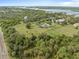 Wide shot of property, showcasing its size and location near the water at 6161 Riverside Dr, Punta Gorda, FL 33982