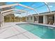 Inviting screened pool area with ample deck space at 3341 Rock Creek Dr, Port Charlotte, FL 33948