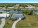 Aerial view of canal-front home with pool and private dock at 3341 Rock Creek Dr, Port Charlotte, FL 33948