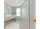 Bathroom with light green walls and shower at 3341 Rock Creek Dr, Port Charlotte, FL 33948