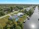 Bird's-eye view of waterfront home, showcasing pool and dock at 3341 Rock Creek Dr, Port Charlotte, FL 33948