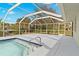 Refreshing screened pool and spacious patio at 3341 Rock Creek Dr, Port Charlotte, FL 33948