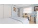 Light blue bedroom with a double bed, desk, and ample closet space at 3341 Rock Creek Dr, Port Charlotte, FL 33948