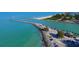 Aerial view of inlet with beach, boats, and parking at 3341 Rock Creek Dr, Port Charlotte, FL 33948