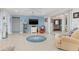 Living room with view of bedroom and access to patio at 3341 Rock Creek Dr, Port Charlotte, FL 33948