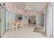 Sunroom with access to bedroom and kitchen at 3341 Rock Creek Dr, Port Charlotte, FL 33948