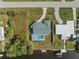 Direct overhead view of house, pool, and backyard at 3341 Rock Creek Dr, Port Charlotte, FL 33948