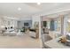 Modern living room with access to pool and patio at 3341 Rock Creek Dr, Port Charlotte, FL 33948