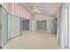 Sunroom with pink and white striped walls and sliding doors at 3341 Rock Creek Dr, Port Charlotte, FL 33948