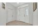 Bright and airy entryway with tile flooring at 176 Jennifer Dr, Rotonda West, FL 33947