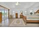 Main bedroom with wood furniture and access to a sunroom at 176 Jennifer Dr, Rotonda West, FL 33947