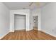 Bright bedroom with wood flooring and a spacious closet at 176 Jennifer Dr, Rotonda West, FL 33947
