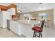 Kitchen with white cabinets, stainless steel appliances, and an island at 176 Jennifer Dr, Rotonda West, FL 33947