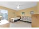 Bedroom with twin bed, futon and window blinds at 176 Jennifer Dr, Rotonda West, FL 33947