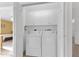 Laundry room with washer, dryer, and overhead cabinets at 176 Jennifer Dr, Rotonda West, FL 33947