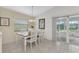 Dining room with sliding doors leading to a patio at 176 Jennifer Dr, Rotonda West, FL 33947