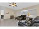 Living Room with leather sofas and ceiling fan at 176 Jennifer Dr, Rotonda West, FL 33947