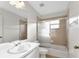 Bathroom with shower/tub combo and updated vanity at 176 Jennifer Dr, Rotonda West, FL 33947