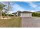 Well-maintained house with a spacious driveway at 176 Jennifer Dr, Rotonda West, FL 33947