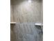 New walk-in shower boasting modern tile surround, corner shelves, and chrome hardware at 22235 Albany Ave, Port Charlotte, FL 33952