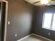 Simple bedroom with tile flooring and a window at 4127 Gardner Dr, Port Charlotte, FL 33952