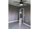 Bedroom with tile floors and mirrored closet doors at 4127 Gardner Dr, Port Charlotte, FL 33952