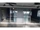 Enclosed patio with glass doors opening to the living area and water views at 4127 Gardner Dr, Port Charlotte, FL 33952