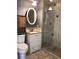 Bathroom with shower, vanity, and toilet at 4127 Gardner Dr, Port Charlotte, FL 33952