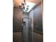 Bathroom with shower, chandelier, and tile at 4127 Gardner Dr, Port Charlotte, FL 33952