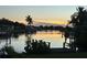 Scenic sunset over the canal, reflecting on the water at 4127 Gardner Dr, Port Charlotte, FL 33952