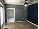 Open living space with tile flooring and access to another room at 4127 Gardner Dr, Port Charlotte, FL 33952