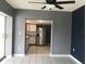 Kitchen with stainless steel appliances and view of living room at 4127 Gardner Dr, Port Charlotte, FL 33952