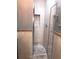 Shower stall with tile surround and glass door at 4127 Gardner Dr, Port Charlotte, FL 33952