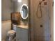 Updated bathroom with tiled shower and vanity at 4127 Gardner Dr, Port Charlotte, FL 33952