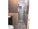 Shower stall with tile surround and glass door at 4127 Gardner Dr, Port Charlotte, FL 33952