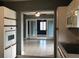 Kitchen with view into living room and breakfast bar at 4127 Gardner Dr, Port Charlotte, FL 33952