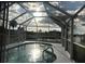 Enjoy sunsets over the canal from this screened pool at 4127 Gardner Dr, Port Charlotte, FL 33952