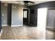 Spacious living area with tile floors and access to backyard at 4127 Gardner Dr, Port Charlotte, FL 33952