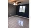 Bedroom with tile floors, ceiling fan and window at 4127 Gardner Dr, Port Charlotte, FL 33952
